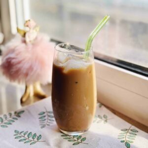 Chocolate Dorayaki with Nutella filling A glass of Earl Grey Caramel Milk Tea on window sill