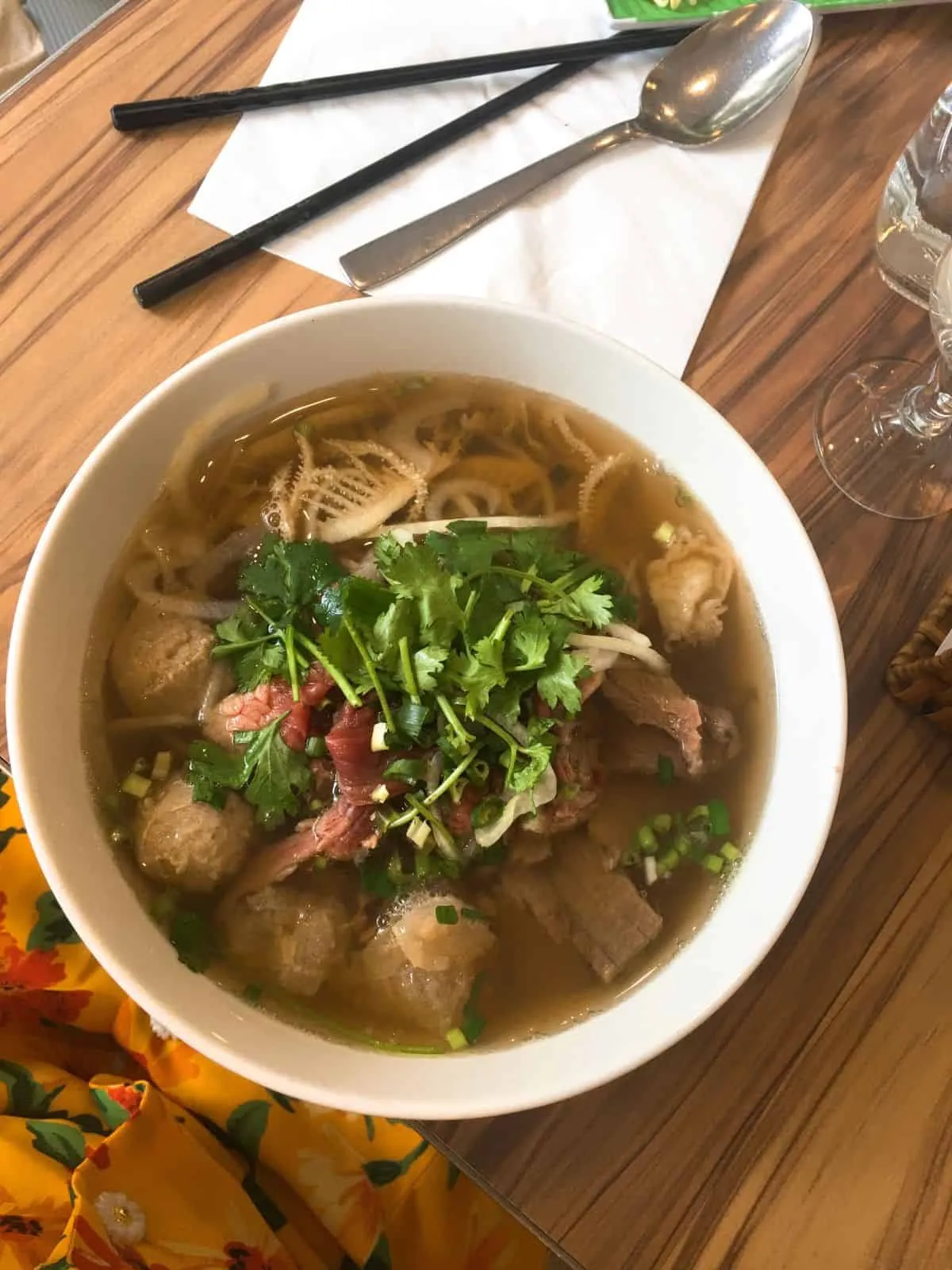 About me A tempting bowl of Pho enjoyed in Paris, featuring steaming rice noodles, flavorful broth, tender beef, fresh herbs, and vibrant toppings.