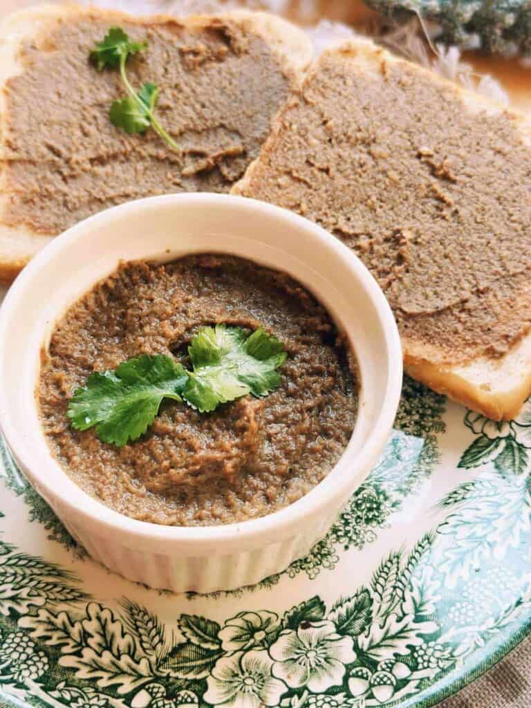 A captivating photo showcasing a Vietnamese pate, exuding a creamy texture and rich flavor. The pate is beautifully presented with garnishes, reflecting the authentic Vietnamese culinary tradition. Its smooth consistency and decadent appearance make it an enticing choice for any food enthusiast.