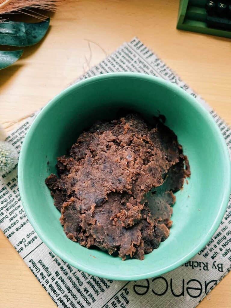 Close-up photo of Japanese Anko, a sweet red bean paste made from adzuki beans, commonly used in traditional Japanese desserts. The paste has a smooth texture and rich red color.
