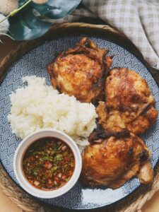Delicious Thai / Lao BBQ Chicken with a tantalizing blend of flavors and aromatic herbs.