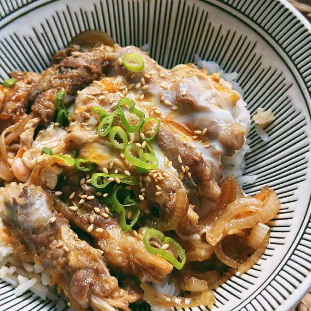 Enoki Beef Rolls over rice