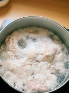 Parboil the pork ribs