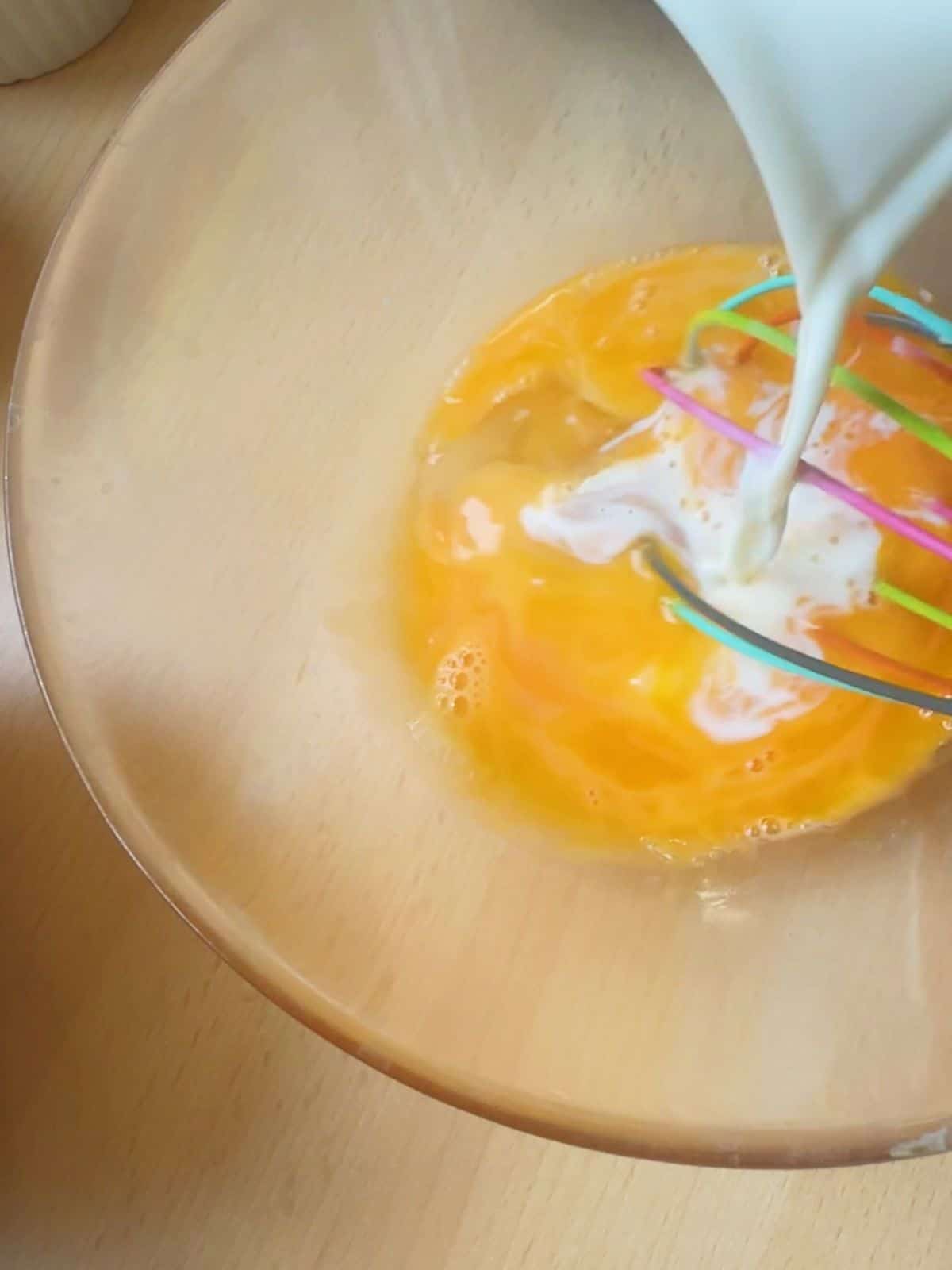 Very Best Vietnamese Flan (Bánh Flan) Pour the milk into the eggs.