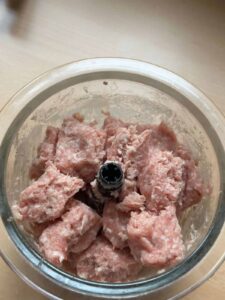 Grind the pork with a food processor.