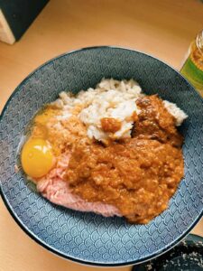 Ground pork, crab meat, crab paste, dried shrimps and an egg in a bowl