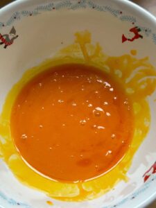 Mắm Chưng (Vietnamese Steamed Egg Meatloaf With Salted Fish) The egg yolks mixed with annatto oil.