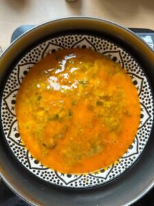 Mắm Chưng (Vietnamese Steamed Egg Meatloaf With Salted Fish) Add the egg yolk on top of the steamed meatloaf.