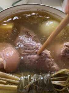 Test the meat for doneness by gently piercing it with a chopstick.