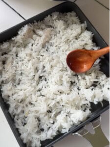 Spread the steamed rice over the nonstick skillet.