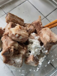 Marinate the ribs.
