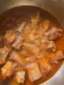 Simmer the ribs.