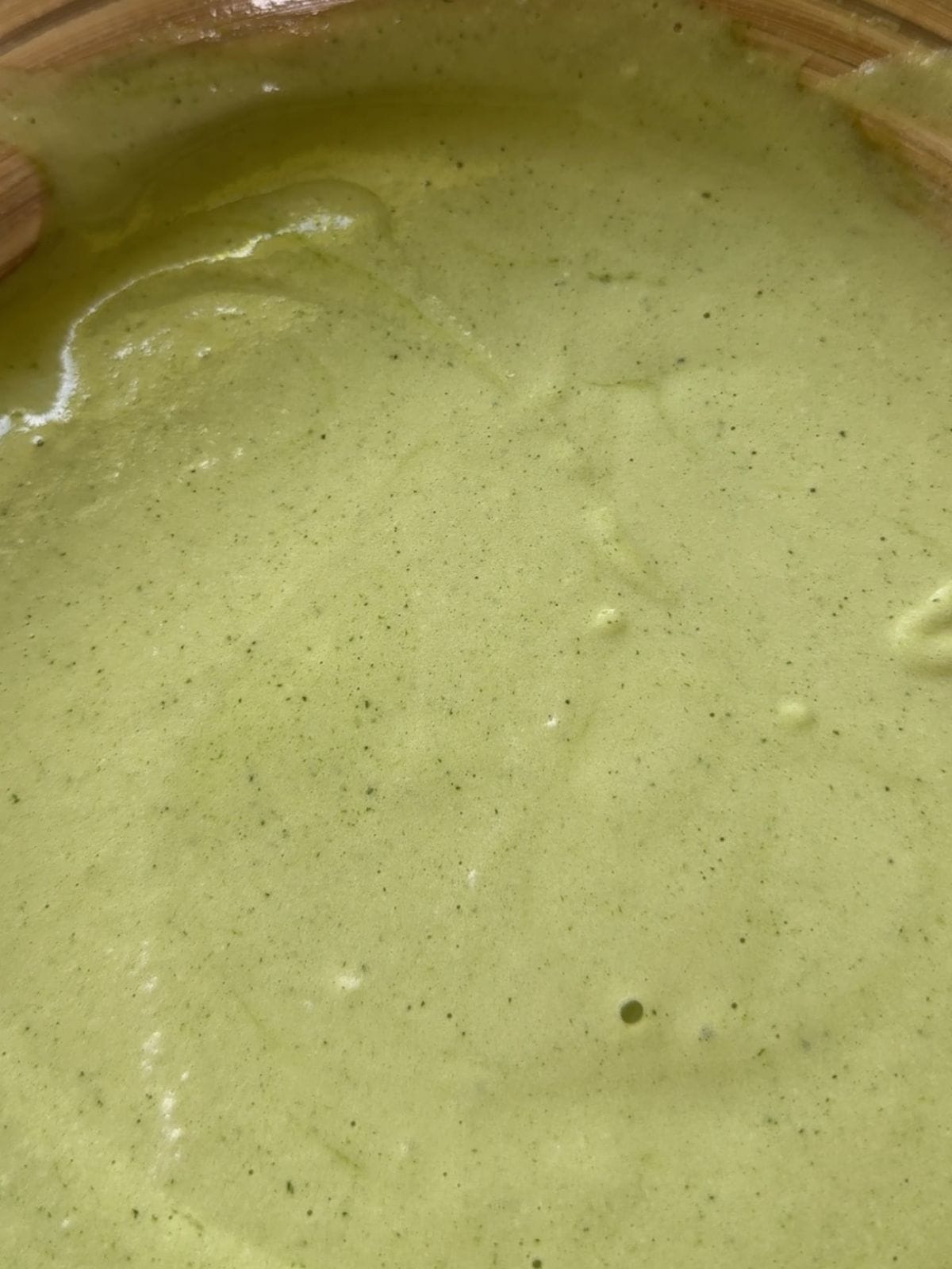 Soft & Fluffy Pandan Chiffon Cake (with Real Pandan) Fold egg white to egg yolk mixture.
