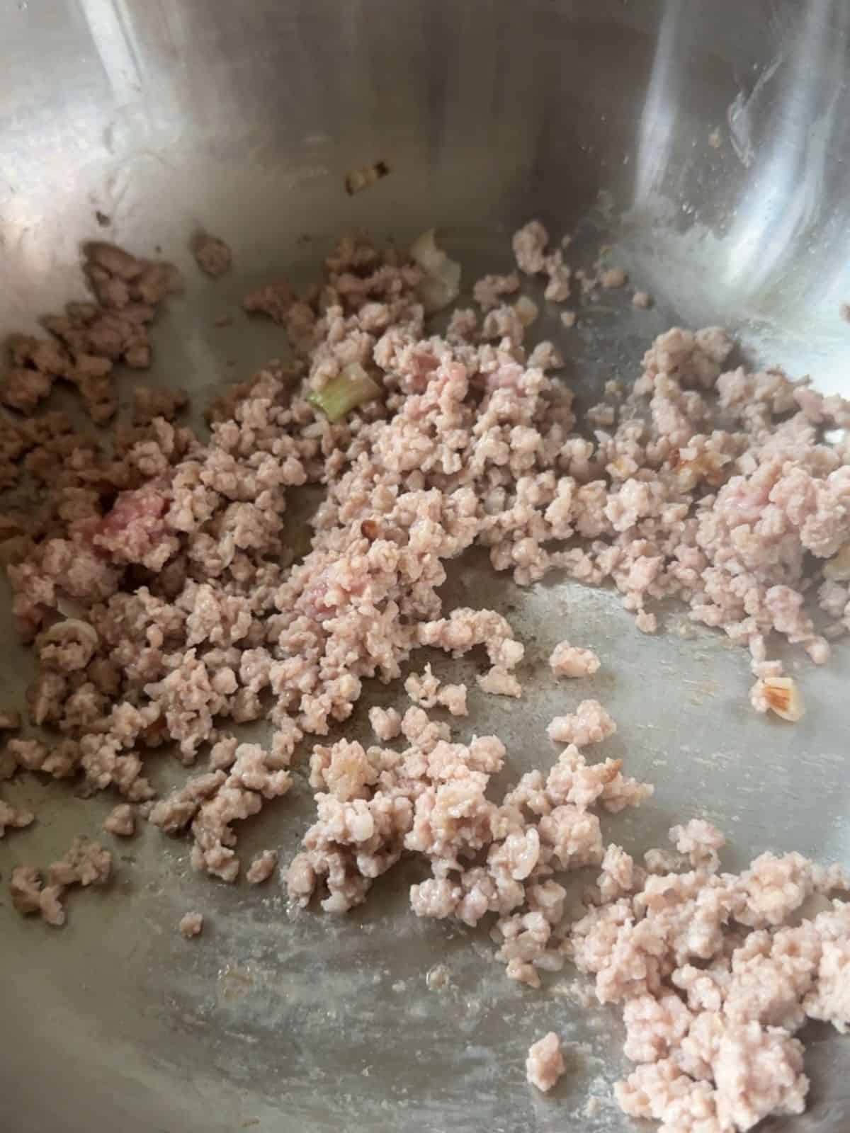 Simple Vietnamese Pumpkin Soup (Canh Bí Đỏ) Sauté minced pork with shallots.