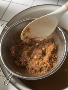 Authentic Bún Mắm | Vietnamese Fermented Fish Noodle Soup Strain the broth to remove solids, then return it to the pot.