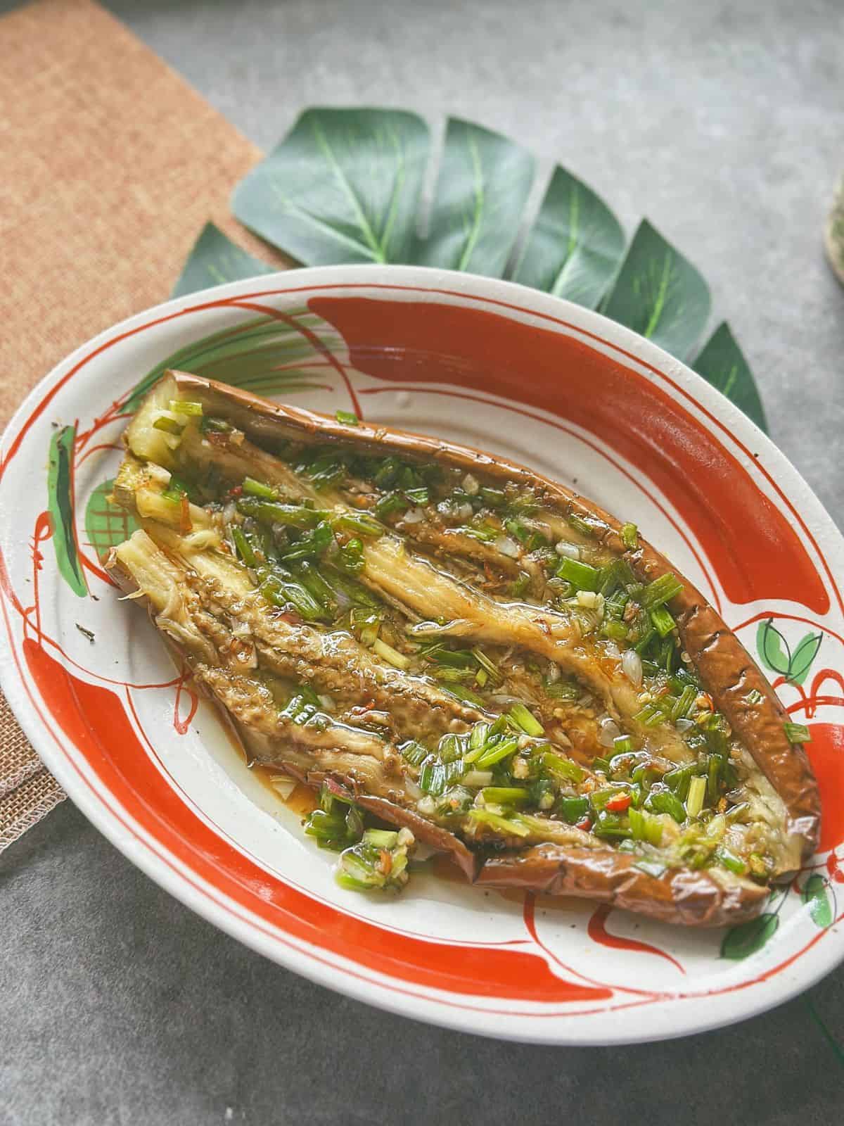 Vietnamese grilled eggplant topped with scallion oil.