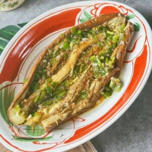 Vietnamese grilled eggplant topped with scallion oil.