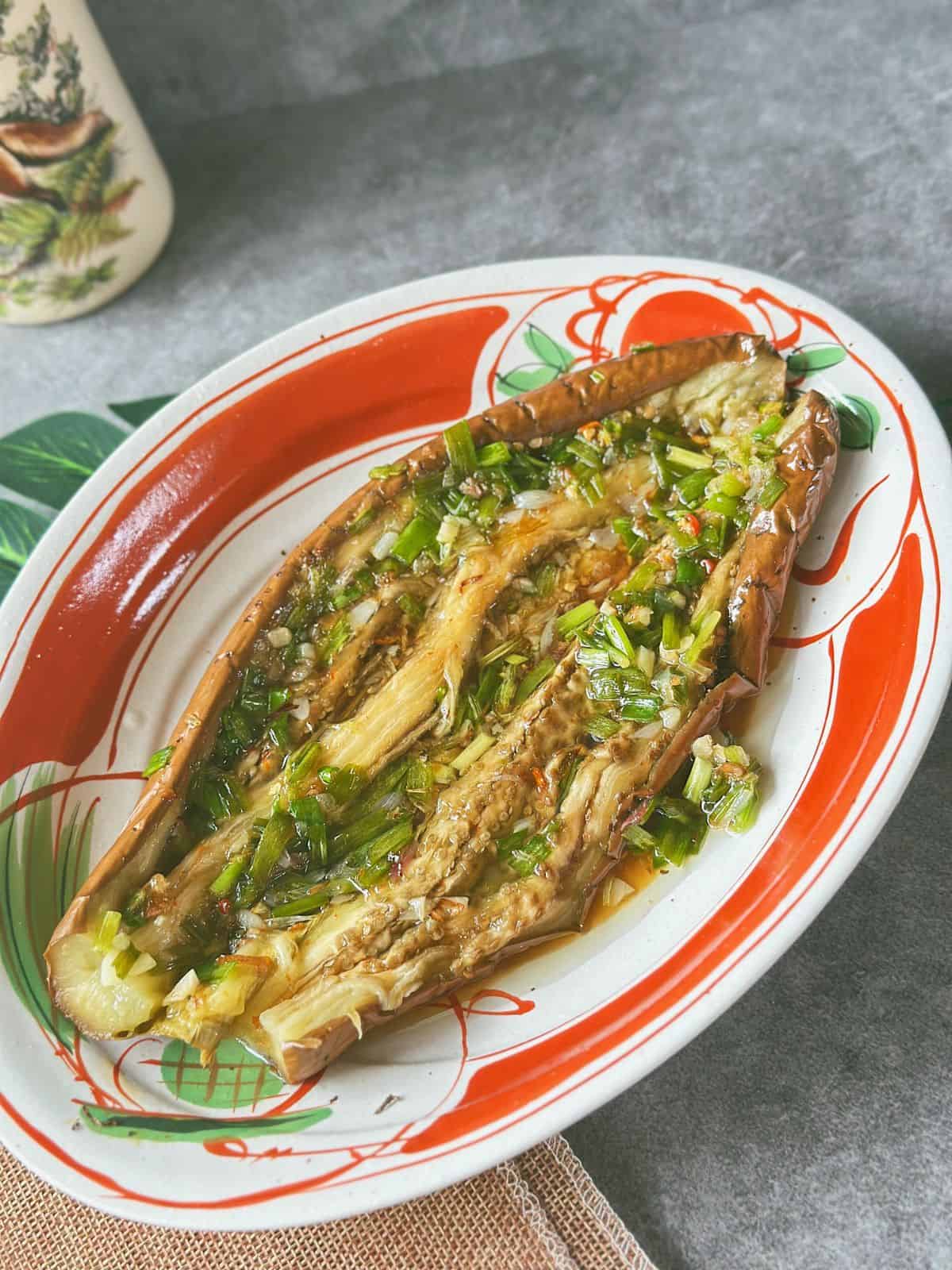 Vietnamese grilled eggplant topped with scallion oil.