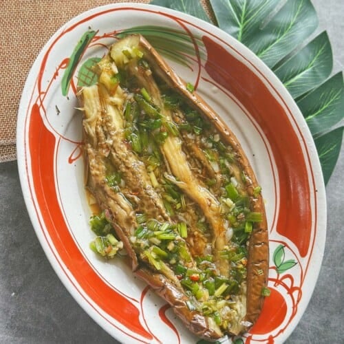 Vietnamese grilled eggplant topped with scallion oil.