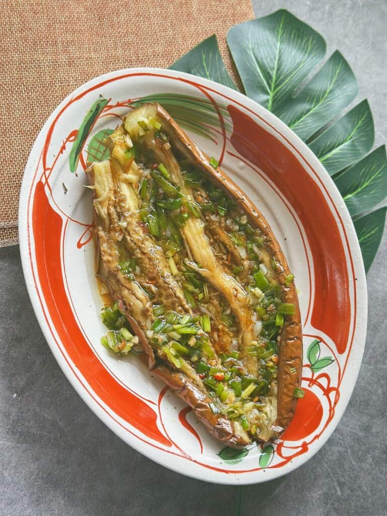 Vietnamese grilled eggplant topped with scallion oil.