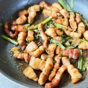 Skillet of Vietnamese crispy caramelized pork belly with scallions (Ba Chỉ Rang Cháy Cạnh).